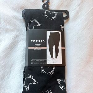 Torrid Black Leggings with White Heart Skeleton Design